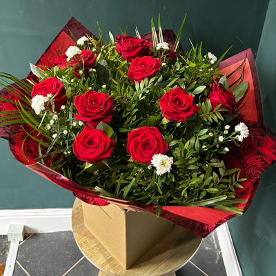 Timeless Love - A classic bouquet of elegant red roses, symbolising eternal love and admiration. Perfect for romantic occasions or to express heartfelt emotions.