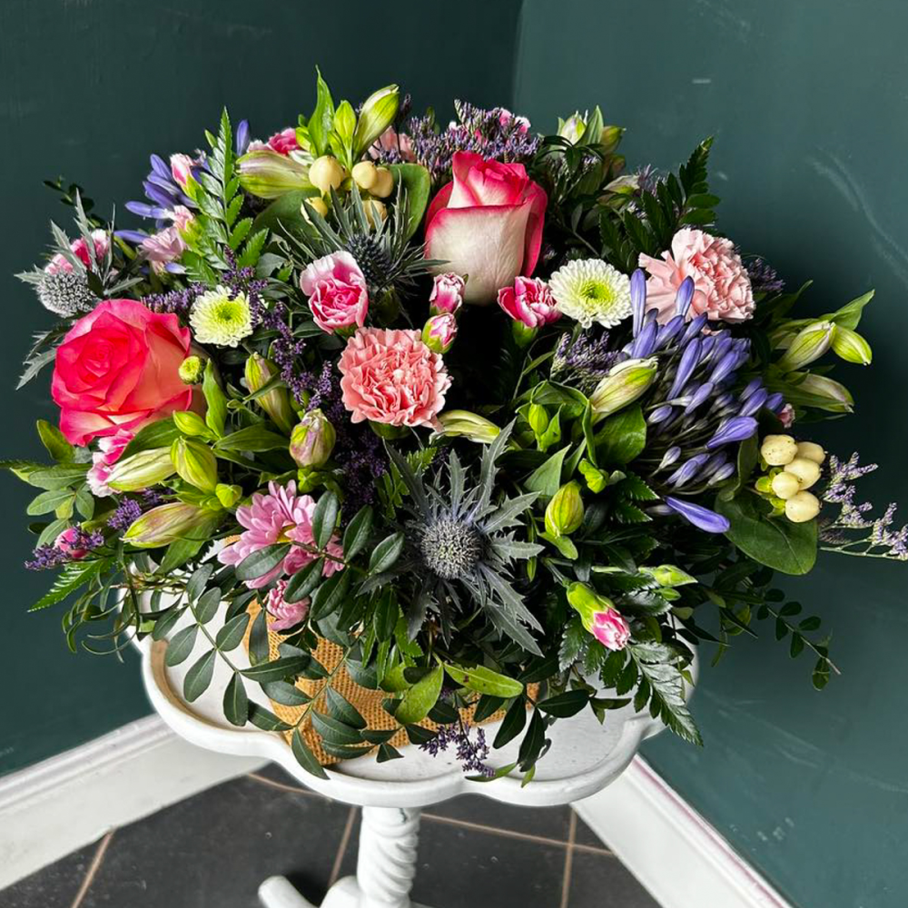 Vibrant Rose and Thistle Arrangement