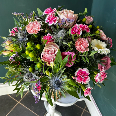 Pink Delight Bouquet - A delightful bouquet featuring pink roses, gerberas, and white hypericum berries. Perfect for celebrating joyful occasions.