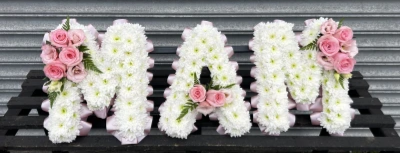 Traditional Funeral Letters - Our traditional funeral letters are made using white chrysanthemum with your choice of ribbon and cluster flower colours. 

Letters are priced at £35 each and we can make any name or word requested please contact us on 0191 4784321 to discuss your requirements